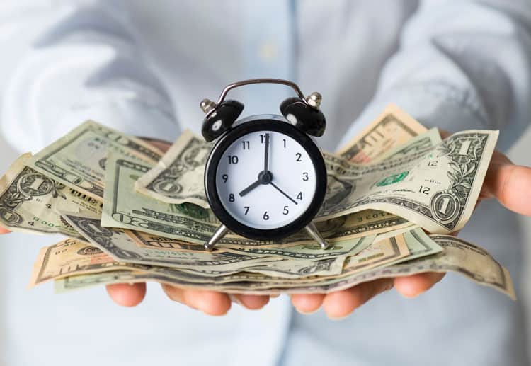 {Updated} Family Travel On A Budget: 17 Tips To Help You Save Money 6 Man Holding Clock And Money