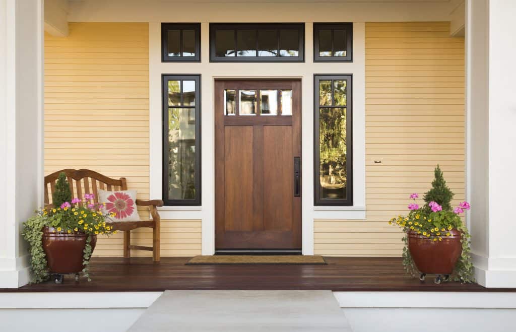 {Updated} Family Travel On A Budget: 17 Tips To Help You Save Money 9 Front Door Of A House