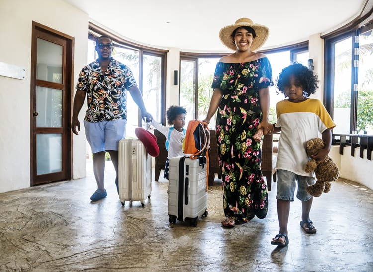 Family Checking Into One Of The Best All-Inclusive Family Resorts