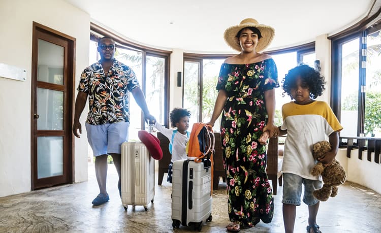Family Checking Into One Of The Best All-Inclusive Family Resorts