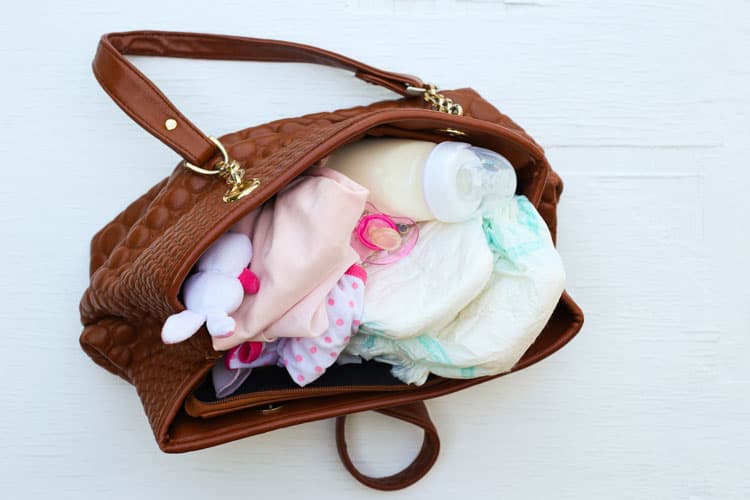 Packed Diaper Bag Following Airline Rules For Flying With Breastmilk