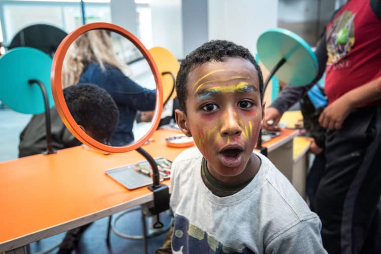 Boy Painting Face At Minnesota Children'S Museum