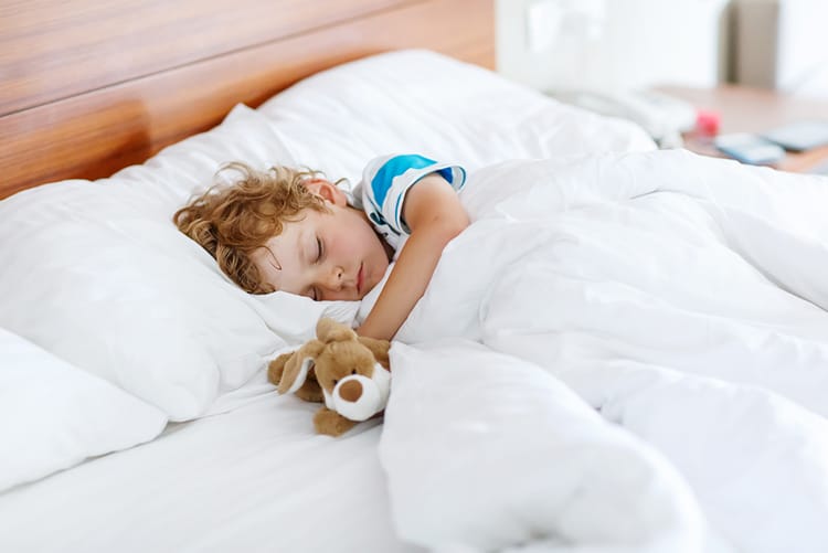 Child Resting Peacefully After Overcoming Baby Sleep Problems