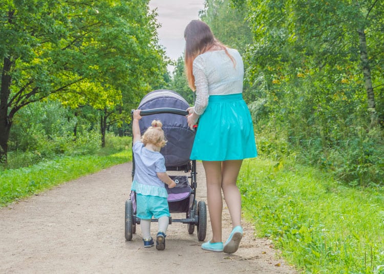 Toddler Walking With Mother For Physical Activity