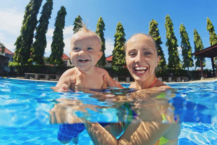 Mother And Son Getting Phyical Activity By Swimming