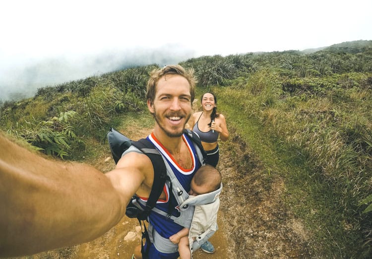 Parents Hiking With Their Baby