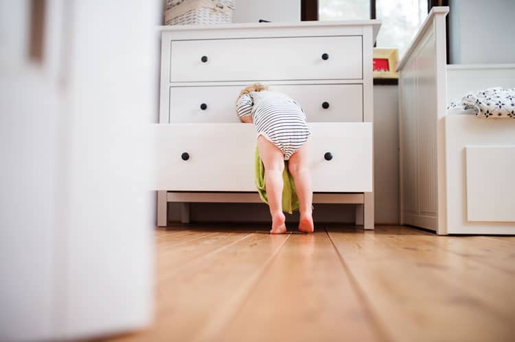 Child In Dresser Drawers