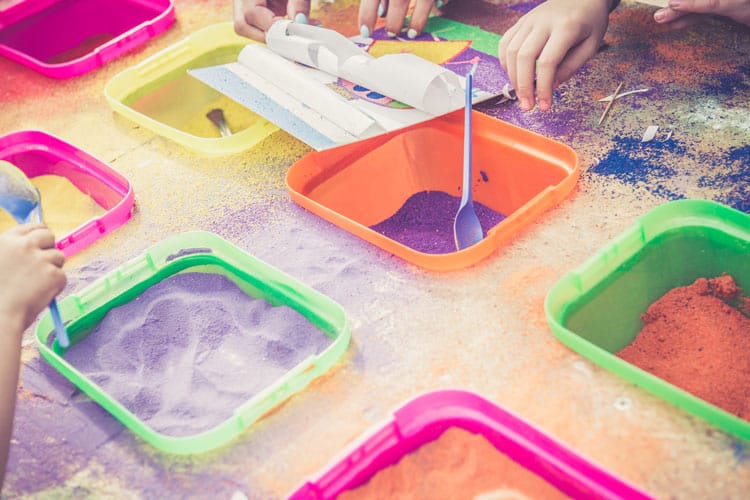 colored sand in containers