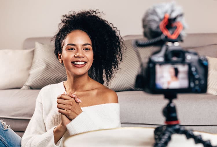 Woman Video Recording Herself To Build A Successful Side Hustle