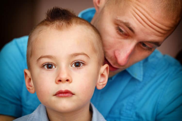 Boy Taking With Father About Back-To-School Anxiety