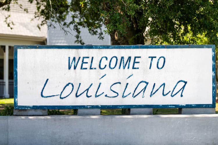 Highway Road With Welcome To Louisiana Sign And Text On Street With Nobody Closeup At Visitor'S Center