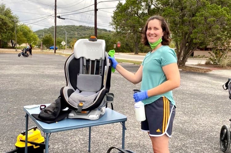 Woman Cleaning Baby Gear