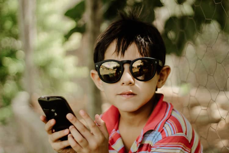 Child On A Cell Phone