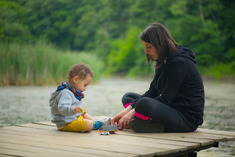 Teachable Moments - Mom Playing With Child Outside