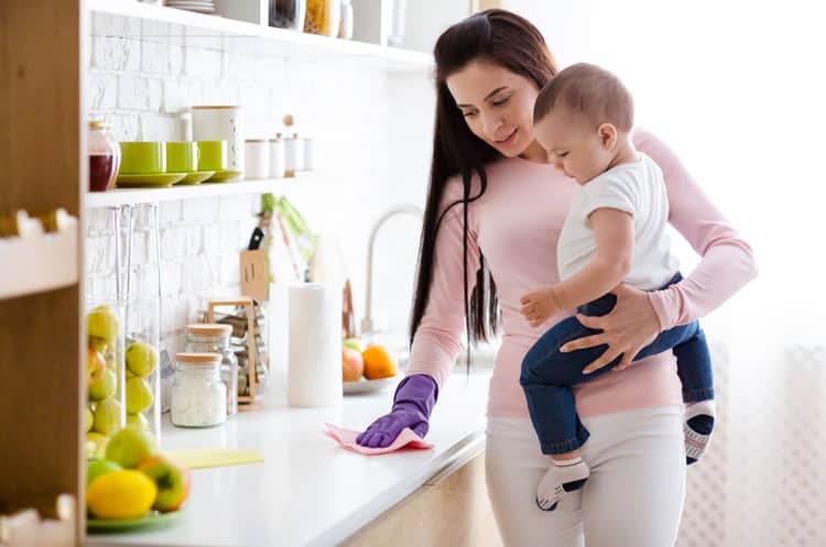 Mom Cleaning With Baby Safe Cleaning Products